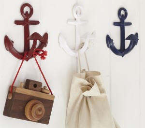 I think I would get 3 navy or 3 white. Perfect for mounting under a floating shelf, and for hanging a few outfits on! 